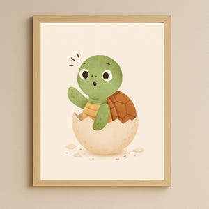 May include: A framed print featuring a cartoon turtle hatching from an egg. The turtle has a green head and limbs, a brown shell, and large eyes. The eggshell is beige, and the background is a light cream color. The artwork is in a whimsical style.
