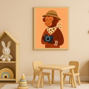 May include: A framed illustration of a monkey wearing a safari hat and a polka-dot scarf, holding a blue camera. The monkey is brown with a smiling face, set against an orange background. The artwork is suitable for a child's room.