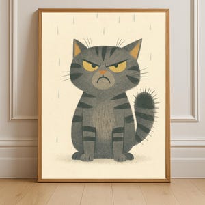 May include: Framed art print featuring a grumpy gray tabby cat with yellow eyes and a striped tail. The cat is sitting with a stern expression against a light yellow background with rain streaks. The artwork is in a wooden frame.