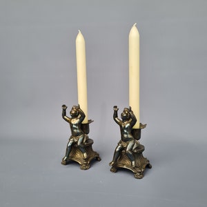 Pair old solid zamac candle holder / candelabra with cherub ++