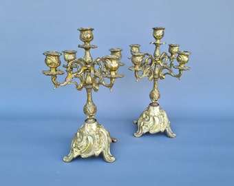 Pair of Louis XV style five-light ormolu candelabras ++