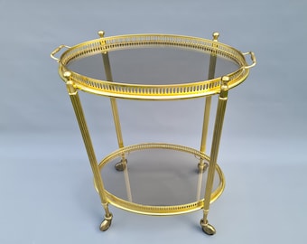 Small elegant brass Italian Hollywood Regency trolley with glass top, 1960's ++