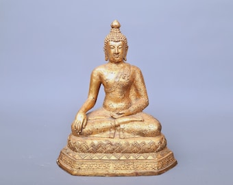 Une figure thaïlandaise dorée d'un bouddha assis, 20ème