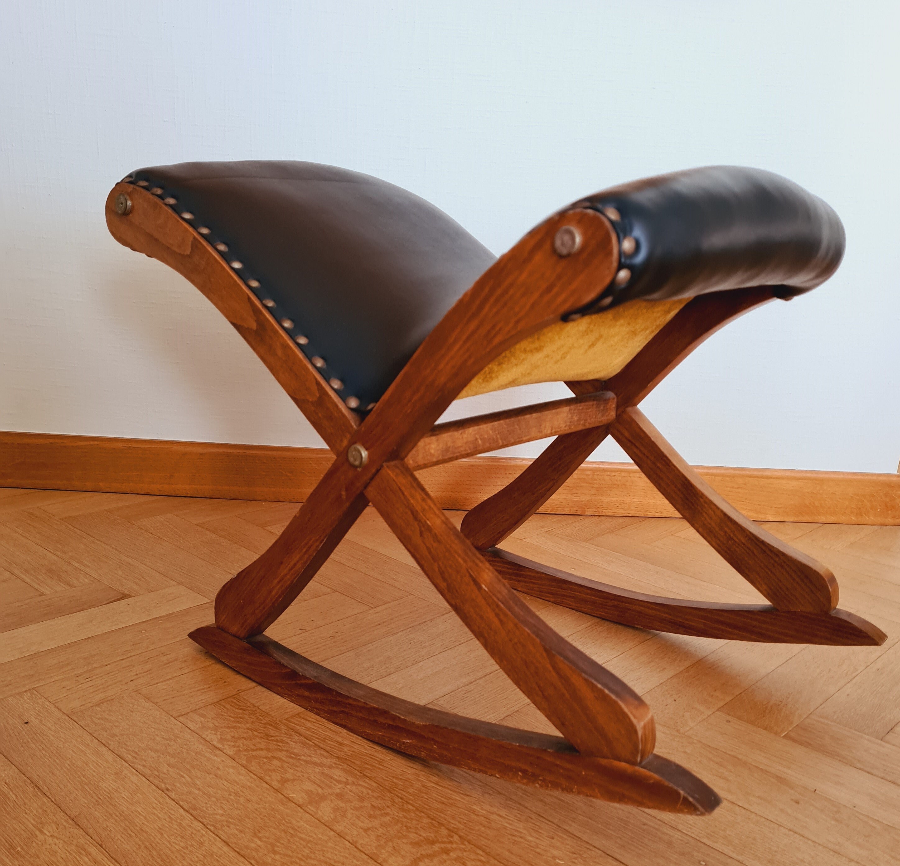 Elegant vintage rocking footstool