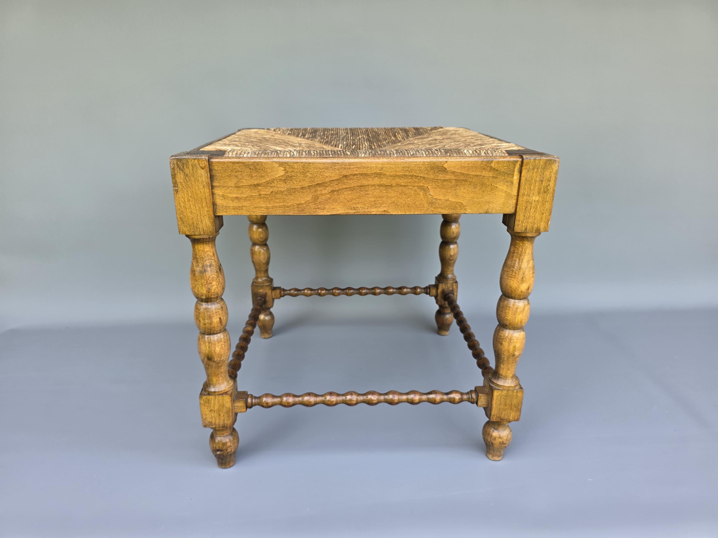 French old wooden stool with wicker seat ++