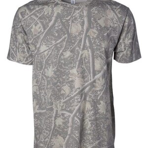 May include: A short-sleeved crew neck t-shirt featuring an all-over gray and off-white camouflage pattern. The design consists of detailed silhouettes of tree branches, twigs, and maple leaves layered across the entire fabric surface.