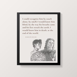 May include: Framed art print featuring a quote by Madeline Miller, with a black frame. The artwork includes a line drawing of two figures and the text: "I could recognize him by touch alone..." The print has a neutral color palette.