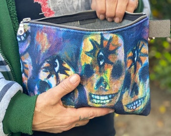 Skull zipper carry-all pouch