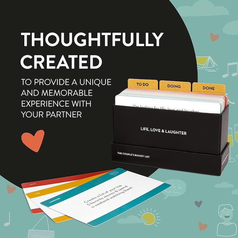May include: A black box with the words "Life, Love & Laughter" and "The Couple's Bucket List" printed on it. The box contains a set of cards with prompts for couples to complete together. The cards are divided into three categories: "To Do", "Doing", and "Done".