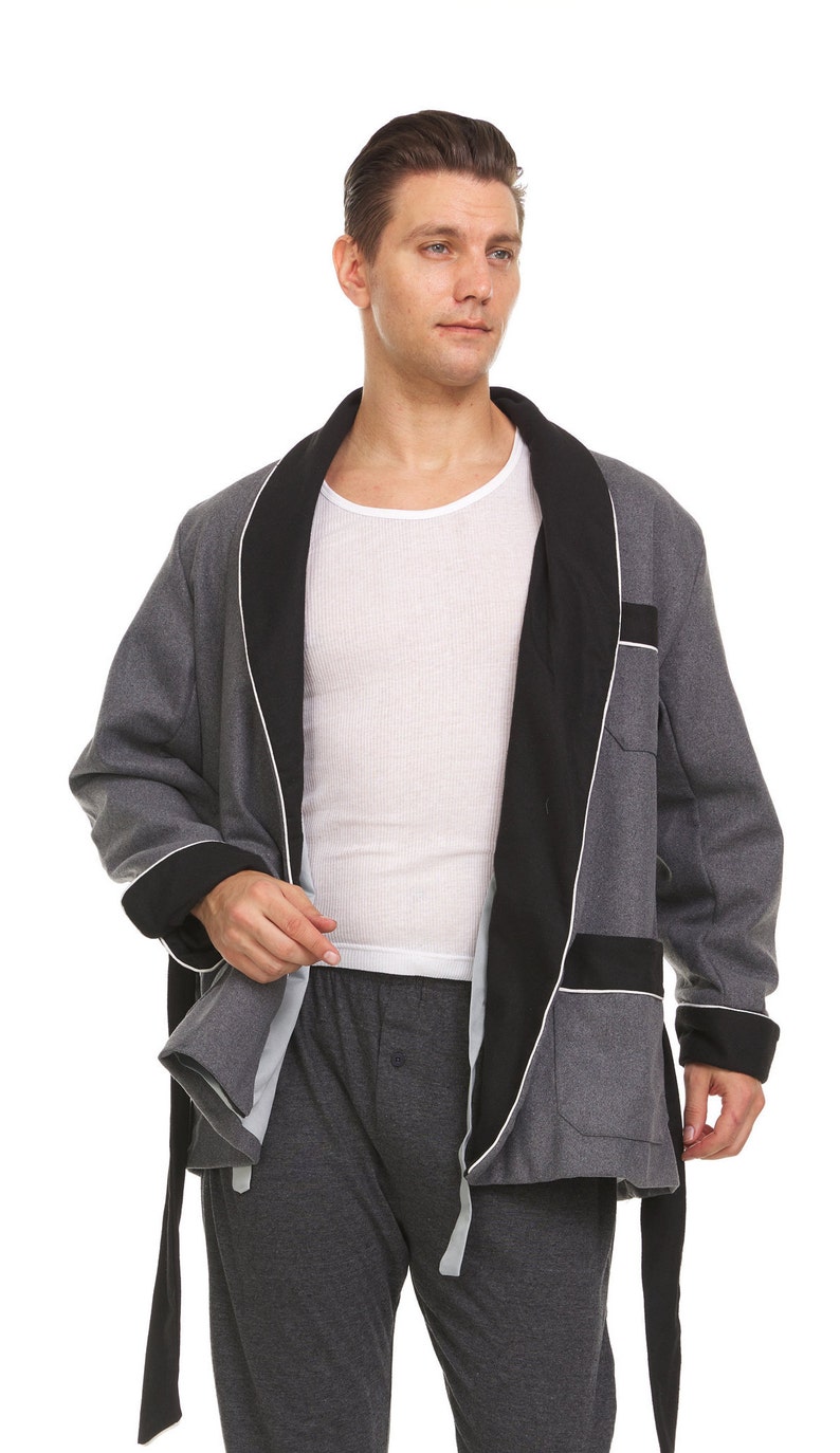 May include: A gray robe with a black satin collar and trim. The robe has a long sash and is worn over a white undershirt and gray pants.