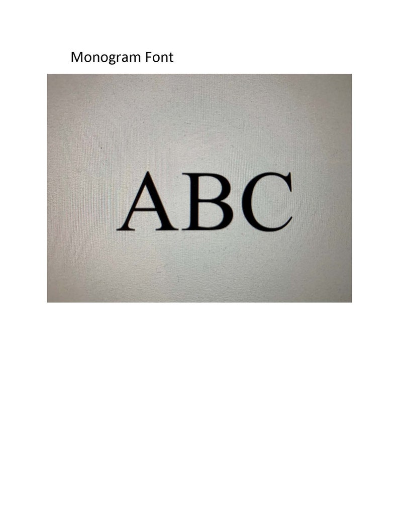 May include: A close-up of the letters A, B, and C in a black, serif font on a white background. The text "Monogram Font" is above the letters.