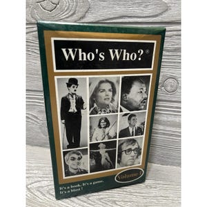 May include: A vintage "Who's Who?" board game box, Volume 1, featuring black and white portraits of famous people. The box has a green border and the game title in bold white letters. The text "It's a book. It's a game. It's a blast!" is printed at the bottom.