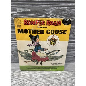 May include: A yellow and red record cover with a picture of Mother Goose riding a goose. The title is "Romper Room Visit with Mother Goose" and the record is 45 RPM. The record is by Peter Pan Players and Orchestra.