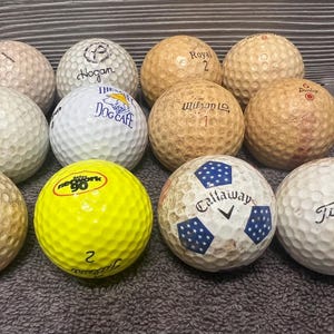 One Dozen Assorted Vintage Golf Balls