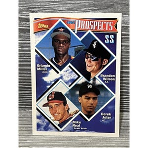 May include: A 1994 Topps baseball card featuring four baseball prospects. The card has a blue background with diamond-shaped portraits of Orlando Miller, Brandon Wilson, Mike Neal, and Derek Jeter. The Topps logo is in the upper left corner.
