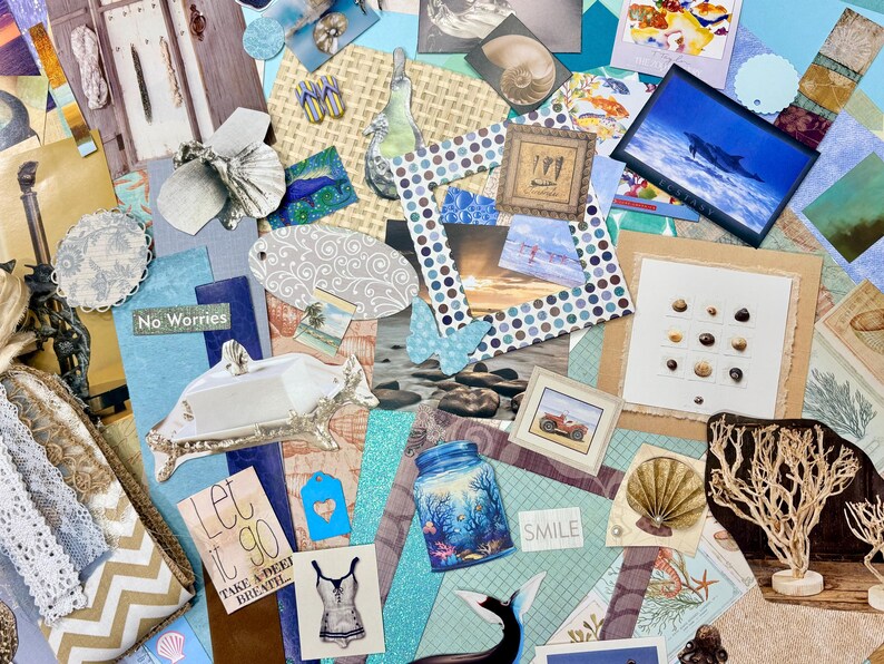 May include: A collage of various beach-themed elements, including framed photos, seashells, and decorative paper cutouts. The color palette includes blues, whites, and tans. There is a jar with a coral reef design and the text "Smile".