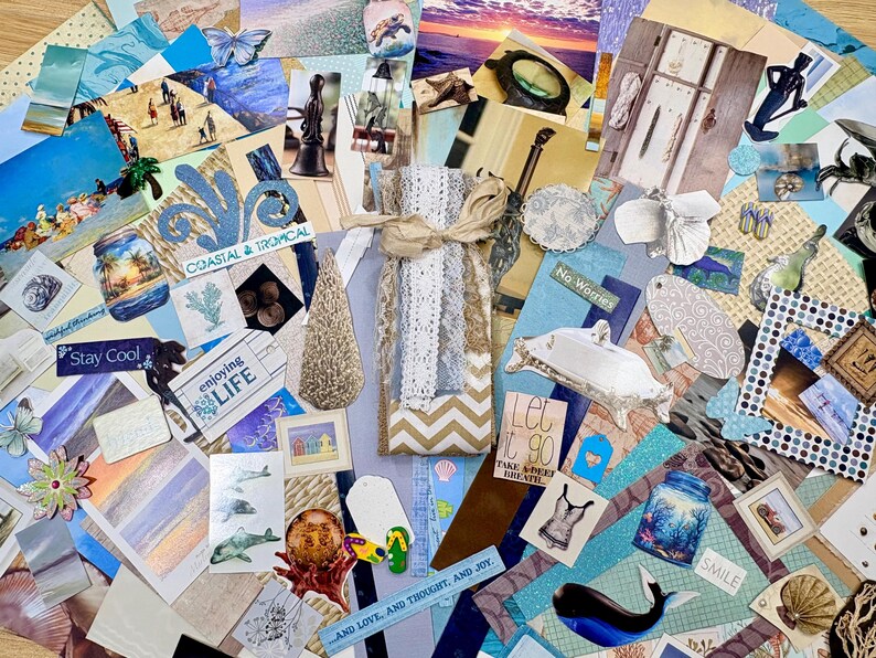 May include: A collage of various coastal and tropical themed items. Includes postcards, decorative elements, and paper cutouts with phrases like "Coastal & Tropical", "Enjoying Life", and "Stay Cool". The color palette is dominated by blues, whites, and beige.
