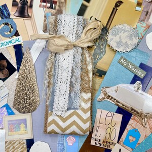 May include: A collage of coastal-themed craft supplies. It includes lace ribbons, tags with text like "Coastal & Tropical" and "Enjoying Life", and decorative elements in shades of blue, beige, and gold. The words "Let it go" are also visible.