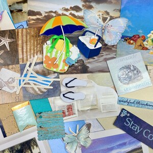 May include: A collage featuring beach-themed cutouts and images. Includes a miniature beach umbrella, a cooler with a drink, a striped tote bag, and a butterfly. Other elements include a seashell image, a wooden sign, and the words "Stay Cool".