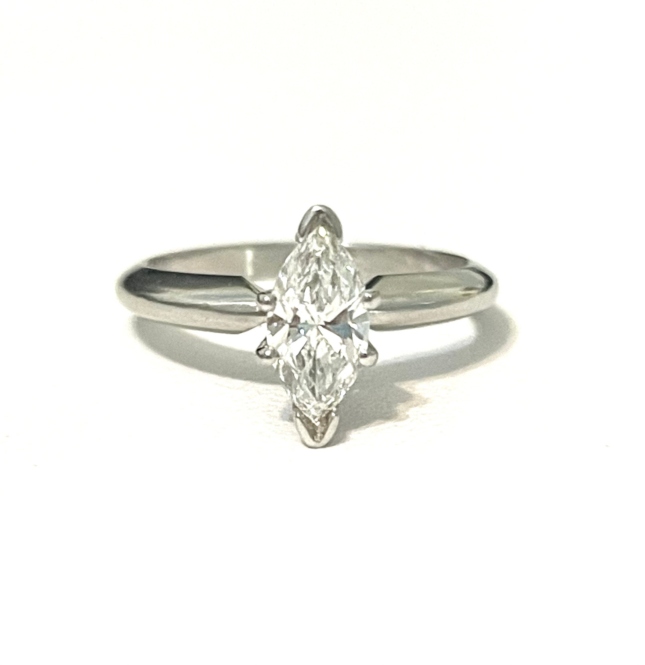 Pt900 ring shop value