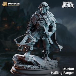 May include: A gray miniature figure of a halfling ranger named Sturian, standing on a rocky base. The character wears a cloak, tunic, and boots, holding a crossbow in one hand and a sword at the hip. Text reads DM STASH, SHADOW OVER WESTLOOK.