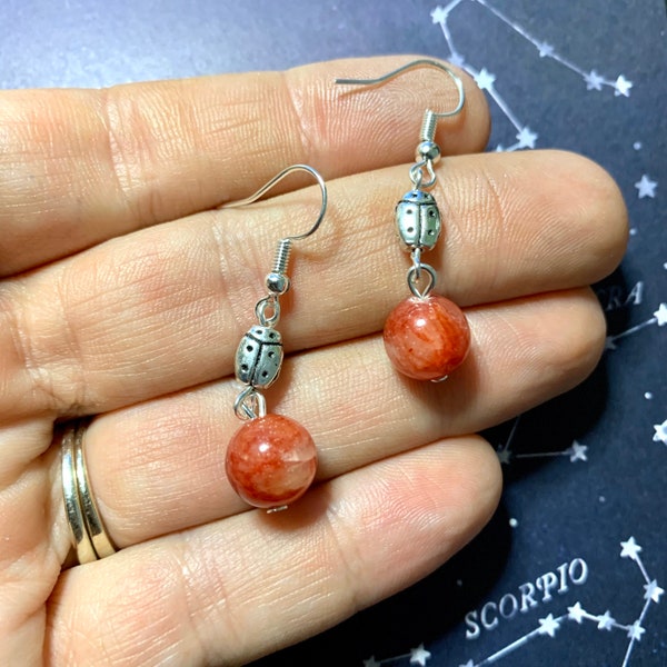 Silver plated lady bug and red quartz bead earrings! Perfect gift or stocking stuffer for the lady bug lover in your life!