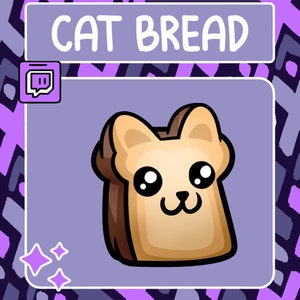 May include: A cartoon illustration of a slice of bread with a cat face. The bread is brown and tan with a white face and big eyes. The text "CAT BREAD" is at the top of the image.