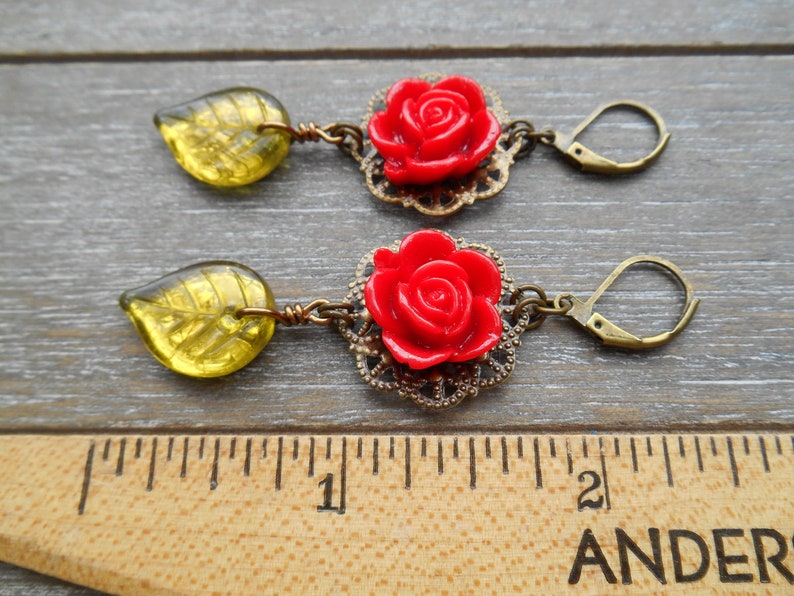Victorian Filigree Earrings with Scarlet Resin Roses and Large Olive Green Czech Glass Leaf Beads in Antique Brass Tone