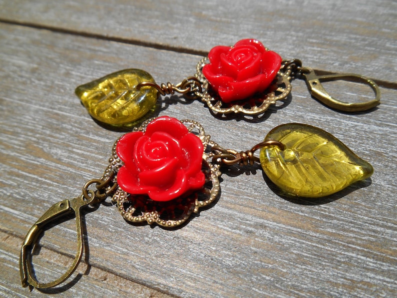 Victorian Filigree Earrings with Scarlet Resin Roses and Large Olive Green Czech Glass Leaf Beads in Antique Brass Tone