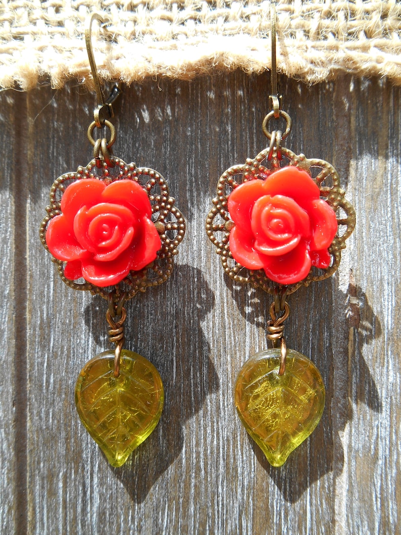 Victorian Filigree Earrings with Scarlet Resin Roses and Large Olive Green Czech Glass Leaf Beads in Antique Brass Tone