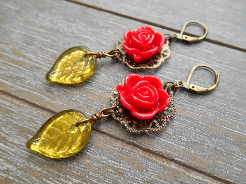 Victorian Filigree Earrings with Scarlet Resin Roses and Large Olive Green Czech Glass Leaf Beads in Antique Brass Tone