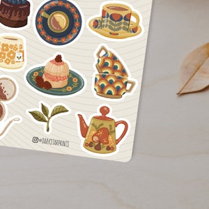 May include: A set of 10 colourful retro-style stickers featuring teacups, teapots, pastries, and tea leaves. The stickers are perfect for adding a touch of vintage charm to your planner, laptop, or water bottle.