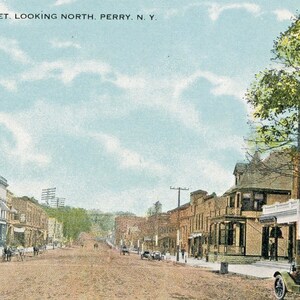 Postcard Early View of Main Street, looking North, Perry. NY. L5
