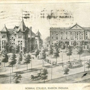 May include: Vintage black and white postcard of Normal College in Marion, Indiana. The image shows two large buildings, trees, a street with a trolley, and horse-drawn carriages. The text "NORMAL COLLEGE, MARION, INDIANA" is at the bottom.