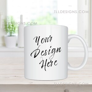 11oz white mug mockup in a clean, modern kitchen with plants background