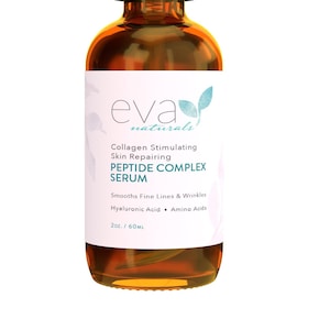 May include: A brown glass bottle with a black pump top dispenser. The bottle is labeled "eva naturals Collagen Stimulating Skin Repairing PEPTIDE COMPLEX SERUM Smooths Fine Lines & Wrinkles Hyaluronic Acid + Amino Acids 2oz / 60ML"