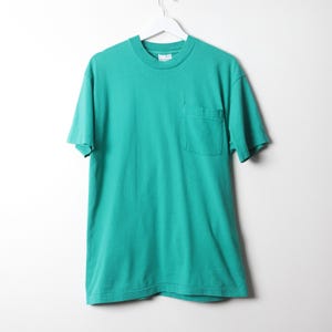 vintage 1990s turquoise blue TEAL pocket t-shirt top -- size LARGE