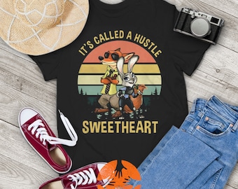 「イッツ・コールド・ア・ハッスル・スウィートハート」ヴィンテージTシャツ、ズートピアTシャツ、ジュディ・ホップスTシャツ、ニック・ワイルドTシャツ、あなたとご家族へのギフトTシャツ