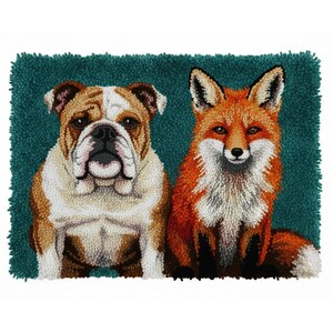 May include: A handcrafted rug featuring a bulldog and a fox, set against a teal background. The bulldog is brown and white, while the fox has orange and white fur. The rug is made with a textured, looped pile.