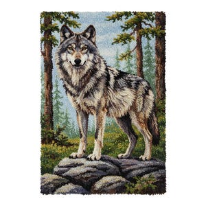 May include: A rectangular rug featuring a detailed image of a gray wolf standing on a rock. The wolf has yellow eyes and is set against a backdrop of trees and a blue sky. The rug is made of textured material.