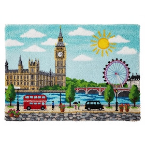 May include: A colorful, textured textile art piece depicting a London cityscape. The artwork features Big Ben, the London Eye, a red double-decker bus, and a sunny sky with clouds. The scene is set along a river with a bridge.