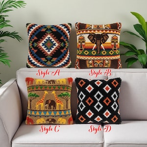 May include: Four decorative throw pillows with textured designs. Styles include geometric patterns and African safari themes with elephants and giraffes. The pillows are displayed on a light gray sofa. The text "Style A", "Style B", "Style C", and "Style D" is visible.