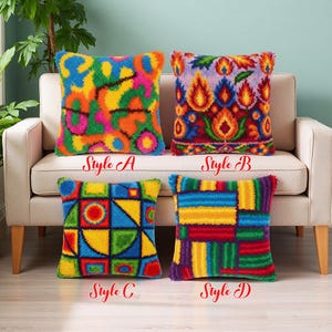 May include: Four decorative throw pillows with colorful, textured designs. Style A features a vibrant mix of colors, while Style B showcases a flame-like pattern. Style C has geometric shapes, and Style D displays a patchwork design. Each pillow has the style name printed on it.