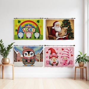 May include: Four decorative wall hangings. One features gnomes with a rainbow and the word "LUCKY". Another shows Santa Claus reading a list. A third depicts a penguin in a winter scene. The last shows gnomes and hearts.