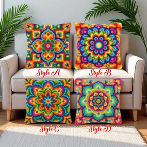 May include: Four square throw pillows with vibrant, colorful mandala designs. Each pillow features a unique pattern in shades of red, orange, yellow, green, blue, and purple. The pillows are labeled "Style A", "Style B", "Style C", and "Style D".