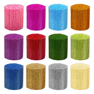 May include: Twelve spools of yarn in various colors, including pink, purple, blue, green, red, orange, gold, and gray. The spools are arranged in three rows of four.