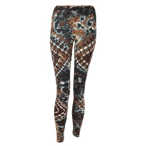 May include: Brown, black, and white tie-dye leggings with a geometric pattern.