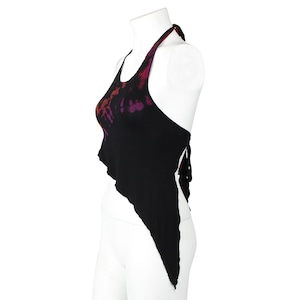 May include: A black halter top with a tie-dye pattern in shades of pink, red, and purple. The top is asymmetrical and has a long, flowing tail.