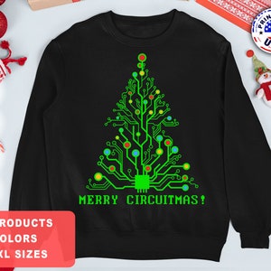 May include: Black sweatshirt with a green circuit board Christmas tree design and the text "Merry Circuitmas!" printed on the front.