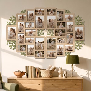 May include: A large, oval-shaped wooden wall collage frame featuring multiple rectangular openings for photographs. The frame is decorated with intricate, light green leaf-shaped cutouts along the outer edges, creating a nature-inspired border.